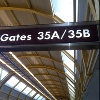Photo taken at Gate D35 by Brian R. on 4/11/2012