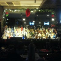 Photo taken at Midtown Drinkery Bar &amp;amp; Grill by Michael R M. on 12/21/2011