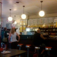 Photo taken at Olympia Coffee Shop by Chris S. on 6/20/2011