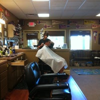 Photo taken at Kennesaw Barber Shop by Jessica B. on 9/14/2011