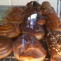 Photo taken at KC Donuts by Tina F. on 9/2/2011