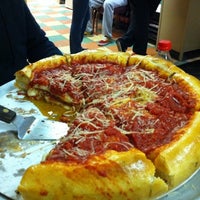 Photo taken at Famulari&#39;s Pizza - Oakbrook by Angie D. on 12/27/2010