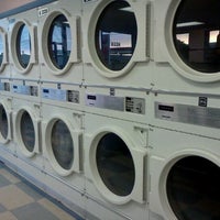 Photo taken at Circle Wash Laundromat by Adam R. on 8/9/2011