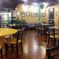 Photo taken at The Earth Cafe &amp;amp; Deli by Gloria on 1/24/2012