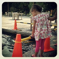 Photo taken at Koi Pond @ National Arboretum by Kriz A. on 7/7/2012
