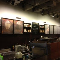 Photo taken at Starbucks by Manu Q. on 6/16/2012
