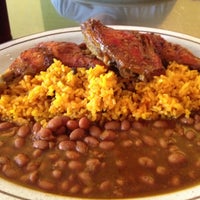 Photo taken at Rincon Criollo Restaurant by Renee B. on 7/19/2012