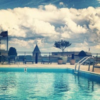Photo taken at 701 Pennsylvania Rooftop Pool by Nic R. on 4/22/2012