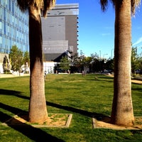 Photo taken at LAPD Lawn Dog Park by Emerson Q. on 4/4/2012