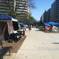 Photo taken at Occupy DC at Freedom Plaza by Tabitha H. on 3/26/2012