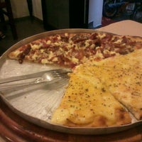 Photo taken at Pizza Chena by Erika M. on 4/12/2012