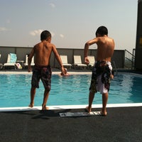 Photo taken at Crowne Plaza Rooftop Pool by Melissa T. on 7/13/2012