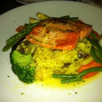 Снимок сделан в Cravings Restaurant + Lounge пользователем Amy C. 5/4/2012