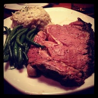 Photo taken at Outback Steakhouse by Chad W. on 2/4/2012