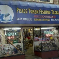Photo taken at Peace Token Fishing Tackle Corp. by Greg C. on 10/21/2011