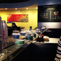 Photo taken at Umi Sushi + Tapas by Maggie D. on 3/18/2012