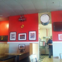 Photo taken at Mia&amp;#39;s Pizza &amp;amp; Eats by Allan C. on 12/17/2011