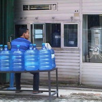 Photo taken at Depot air minum Reverse Osmosis ( R.O ) al munawar by Jepi A. on 10/28/2011