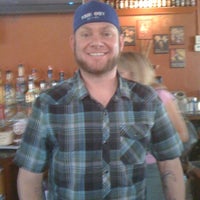 Photo taken at Time-Out Sports Bar &amp;amp; Grill by Carrie B. on 5/8/2011