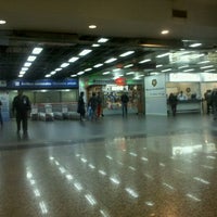 Photo taken at International Arrivals by Santi G. on 6/26/2012