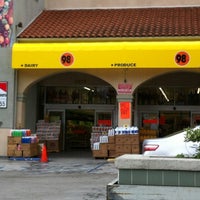 Photo taken at 98 Cent Plus Super Market &amp;amp; La Brea Cigarettes by Nadeem B. on 5/2/2012
