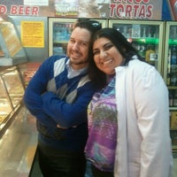 Photo taken at Flores Meat Market by Corrie H. on 2/16/2012