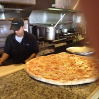 Photo taken at Russo&amp;#39;s New York Pizzeria by Brett B. on 1/12/2012