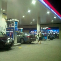 Photo taken at Esso Petrol Kiosk by Masz D. on 7/14/2012