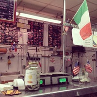 Photo taken at Graham Avenue Meats and Deli by Rich K. on 9/11/2012