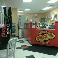 Photo taken at Moe&amp;#39;s Italian Sandwiches by Ashley M. on 4/3/2012