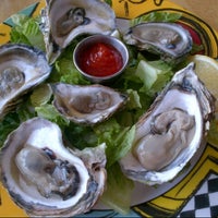 Photo taken at Bell Buoy Restaurant by Dan C. on 8/15/2012