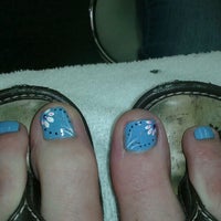 Photo taken at Rainbow Nails by Julie F. on 9/1/2012