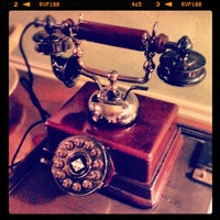 Photo taken at Windsor Court Hotel by Frankie L. on 7/27/2012