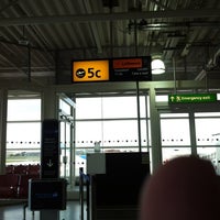 Photo taken at Gate 5 by Ben S. on 5/12/2012