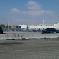Photo taken at Russell and Smith Ford by Oscar B. on 3/31/2012