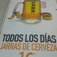 Photo taken at 100 Montaditos by Carlos on 7/30/2012