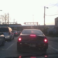 Photo taken at Michigan Street Railroad Crossing by Alec S. on 4/1/2012