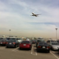 Photo taken at LAX Parking Lot E by Christian E. on 7/9/2012