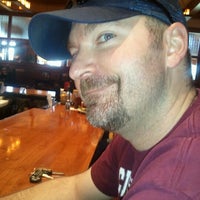 Photo taken at Oggie&amp;#39;s Sports Bar and Emporium by Molly M. on 6/10/2012