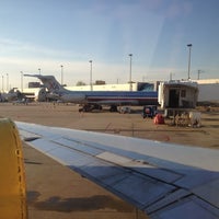 Photo taken at Gate D4 by Graciela S. on 3/27/2012
