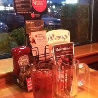 Photo taken at Applebee&amp;#39;s Grill + Bar by Allen C. on 2/13/2012