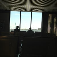 Photo taken at Gate A46 by Giorgia D. on 7/5/2012