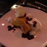 Photo taken at Krave Restaurant &amp;amp; Lounge by Rick N. on 8/8/2012