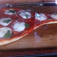 Снимок сделан в Crust Pizza &amp;amp; Wine Cafe пользователем David G. 6/30/2012