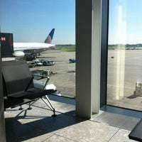 Photo taken at Gate 49 by Ivan A. on 5/26/2012