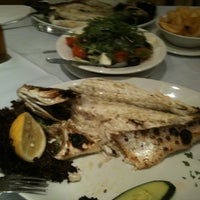 Photo taken at Friends Mediterranean Fish Restaurant by Hande G. on 8/14/2012