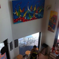 Foto tomada en Orange cafe+art  por VISIT FLORIDA Entertainment &amp; Luxury Insider el 7/6/2012