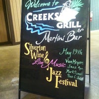 Photo taken at Creekside Grill &amp;amp; the Grotto Martini Bar by Christian C. on 5/11/2012