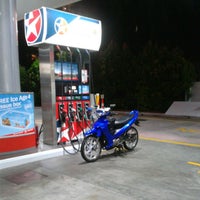 Photo taken at Caltex by Jiaming D. on 7/18/2012