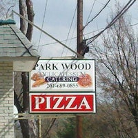 Photo taken at Park Wood Deli &amp; Catering by Carlos P. on 3/20/2012